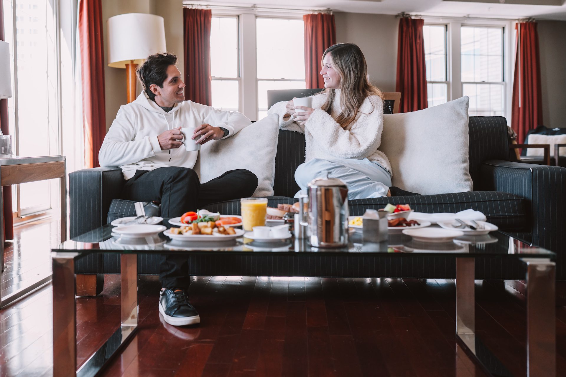 couple holding each other in car